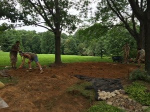 Another crew member working hard to make sure the rain garden is perfect!