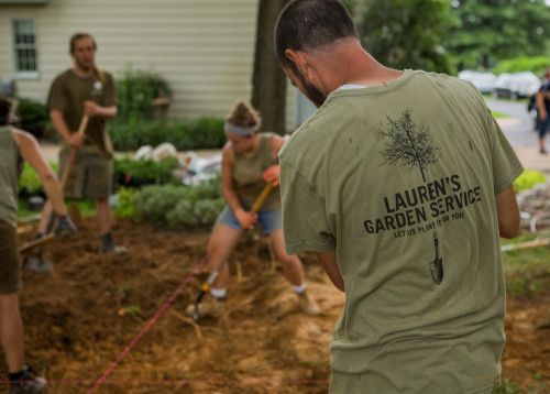 crew members excavating at a work site